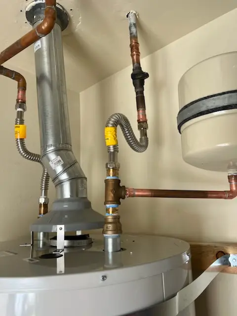 Water heater installation and plumbing repair in Country Club Manor